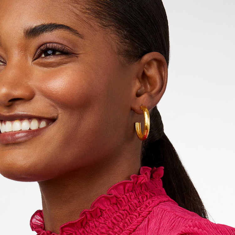 Havana Hoop earrings featuring a gold-tone finish with an intricate filigree pattern and circular silhouette.