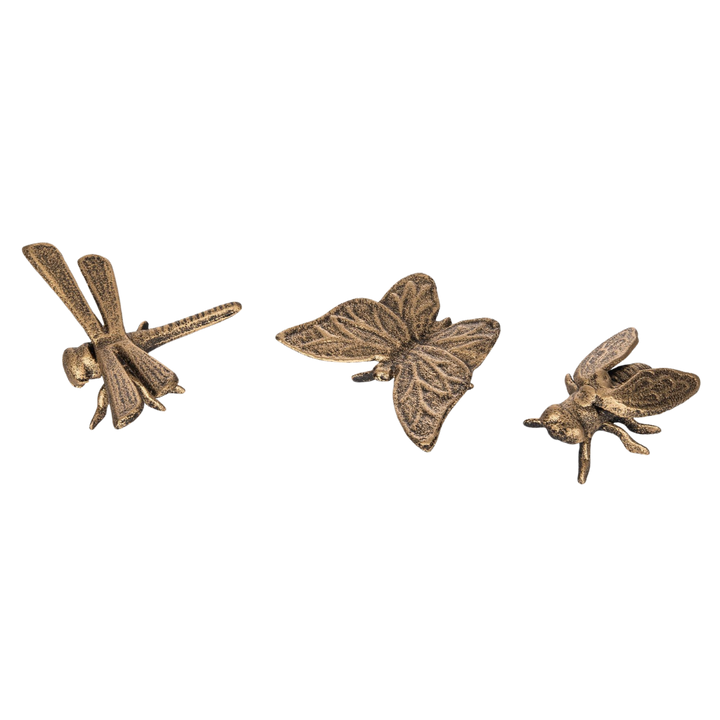 Iron decorative pollinator figurine with intricate bee, butterfly, and dragonfly designs in a nature-inspired silhouette.