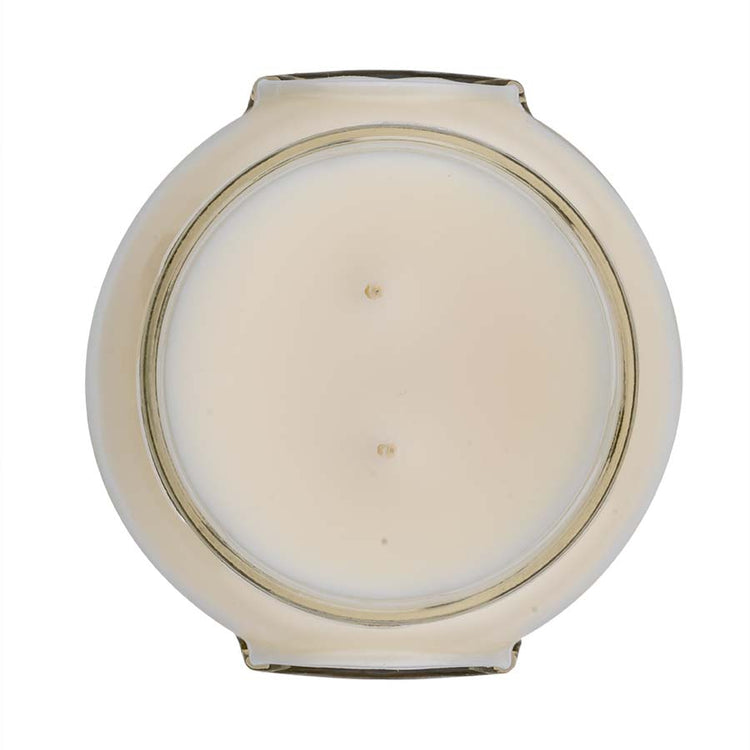 A Regal scented candle in a 22oz glass jar with a white soy/paraffin blend wax and cotton wick.