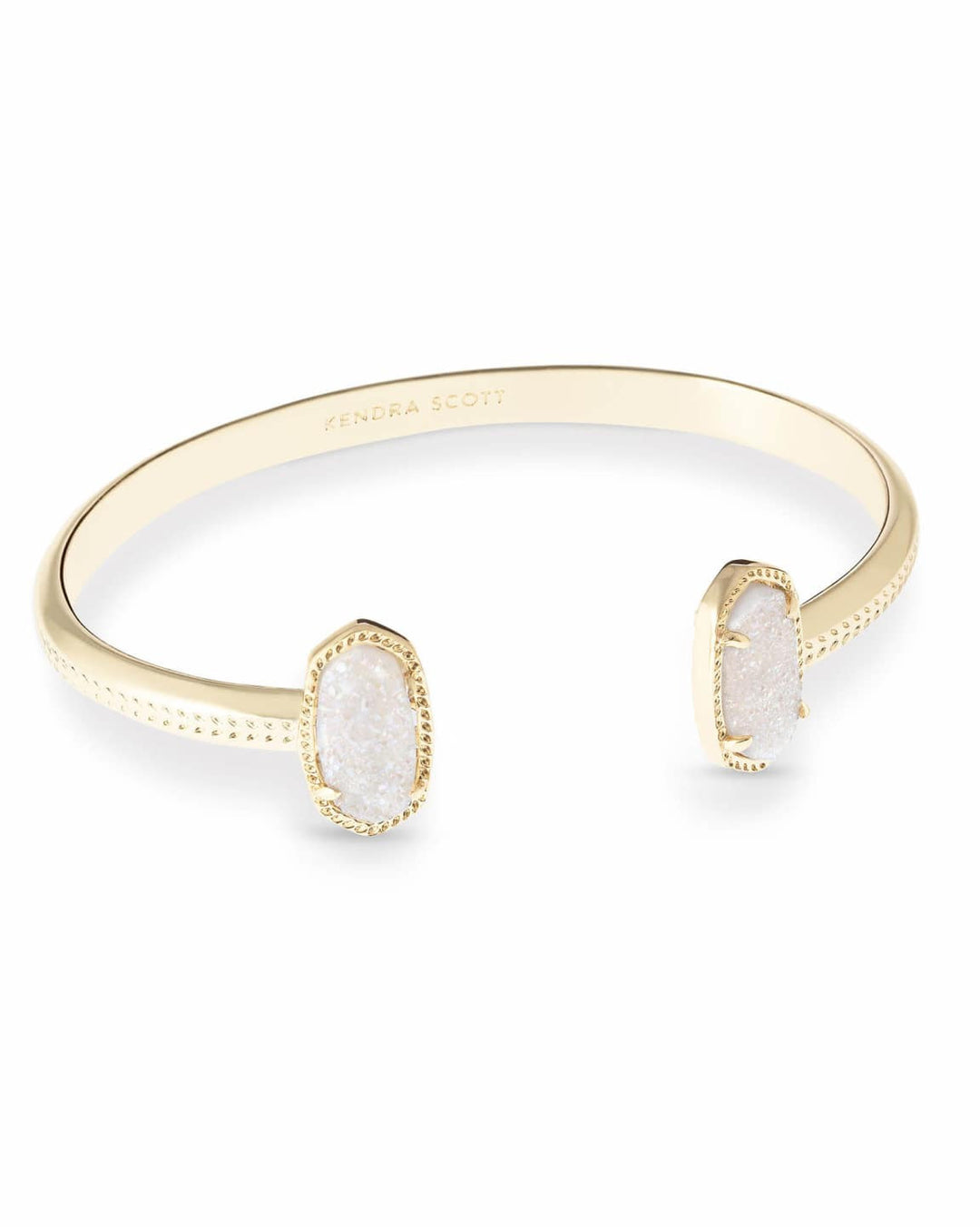 Gold Elton Cuff Bracelet with two oval white druzy stones on an open, adjustable band.