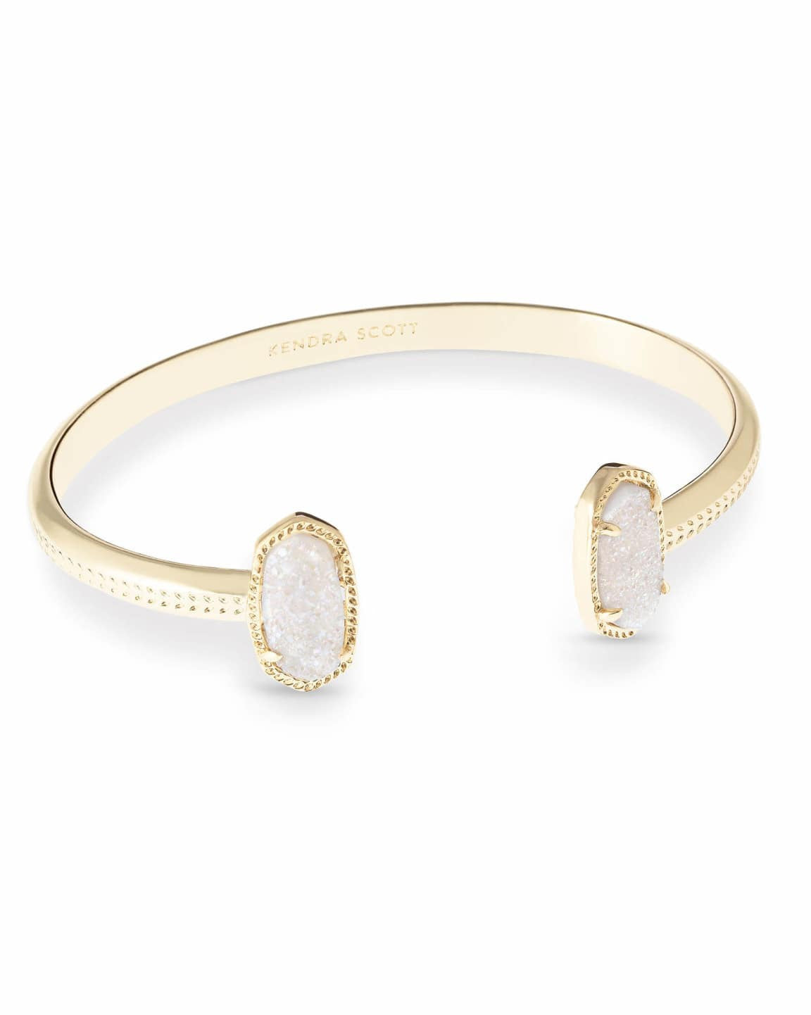 Gold Elton Cuff Bracelet with two oval white druzy stones on an open, adjustable band.