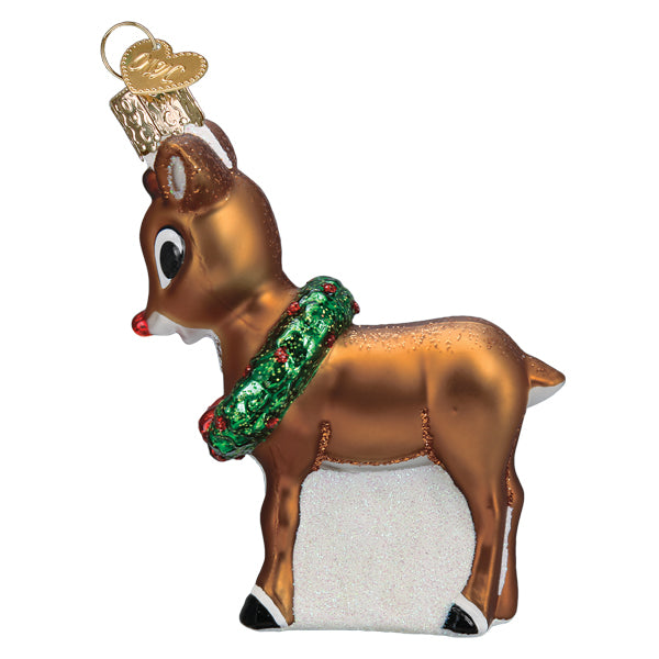 Glass Rudolph the Red-Nosed Reindeer ornament with a green wreath and glittery snow base.