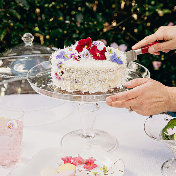 Glass Isabella cake stand with a round platter on an eye-catching pedestal base.