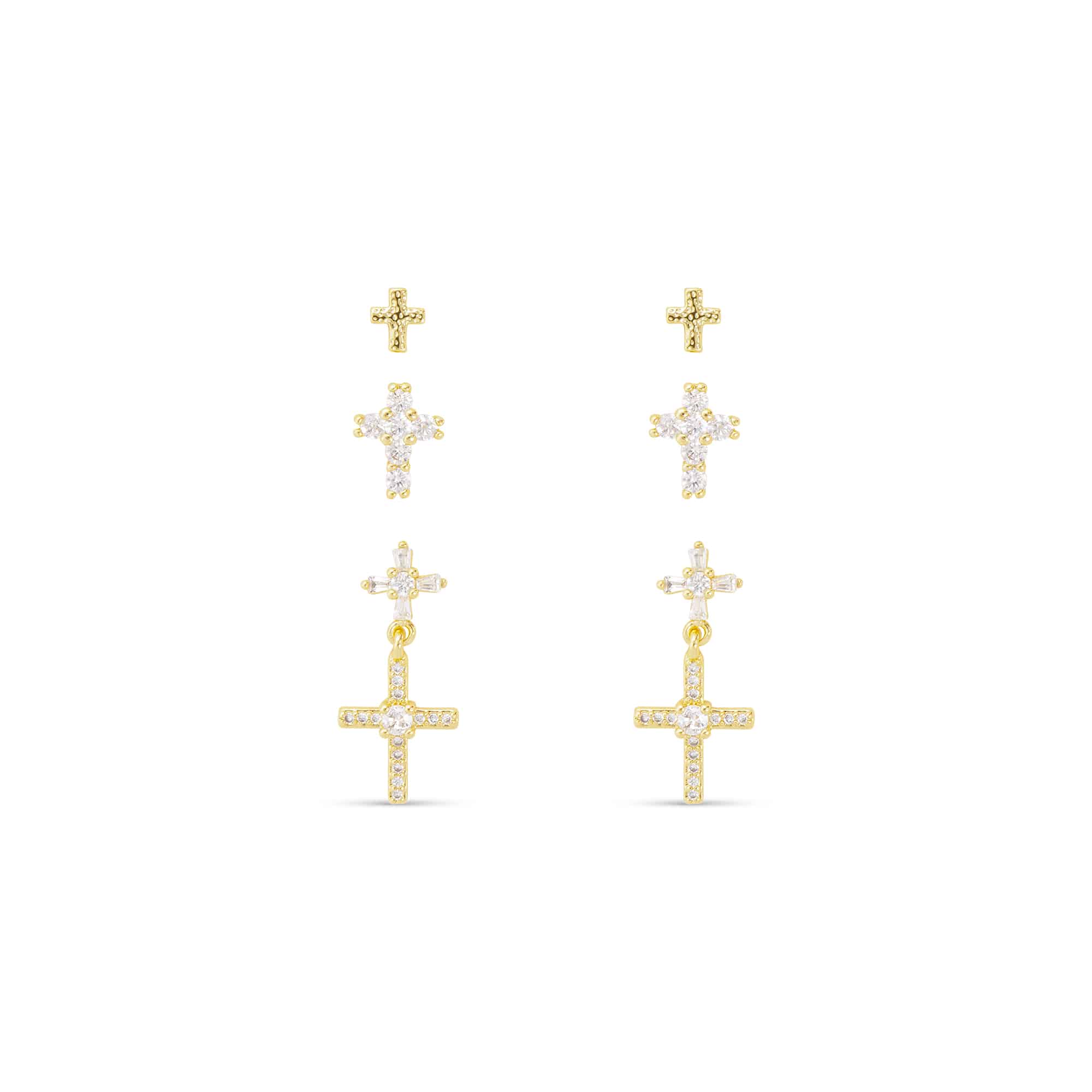 Three pairs of gold-tone cross stud and drop earrings with clear cubic zirconia accents.