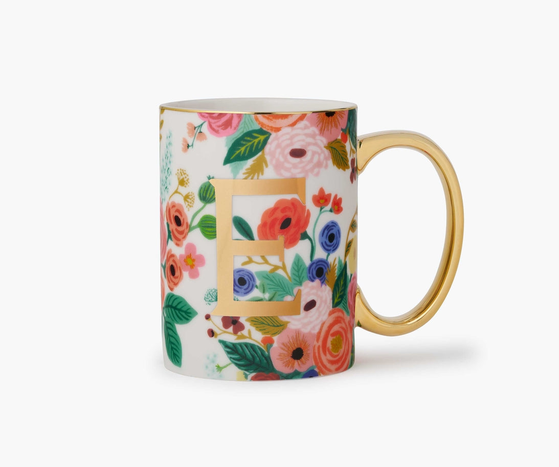 Porcelain mug with gold monogram, gilded rim, handle, and Garden Party illustrated design.