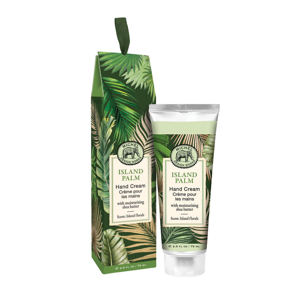 Front view of a white cylindrical tube labeled Island Palm Hand Cream with green palm leaf accents.