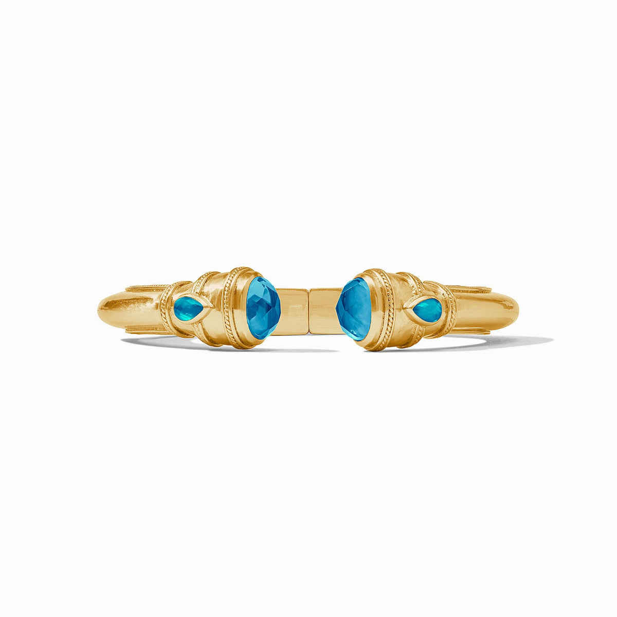 Cannes Demi Cuff in gold with shell pearl endcaps and pear-shaped gemstones.