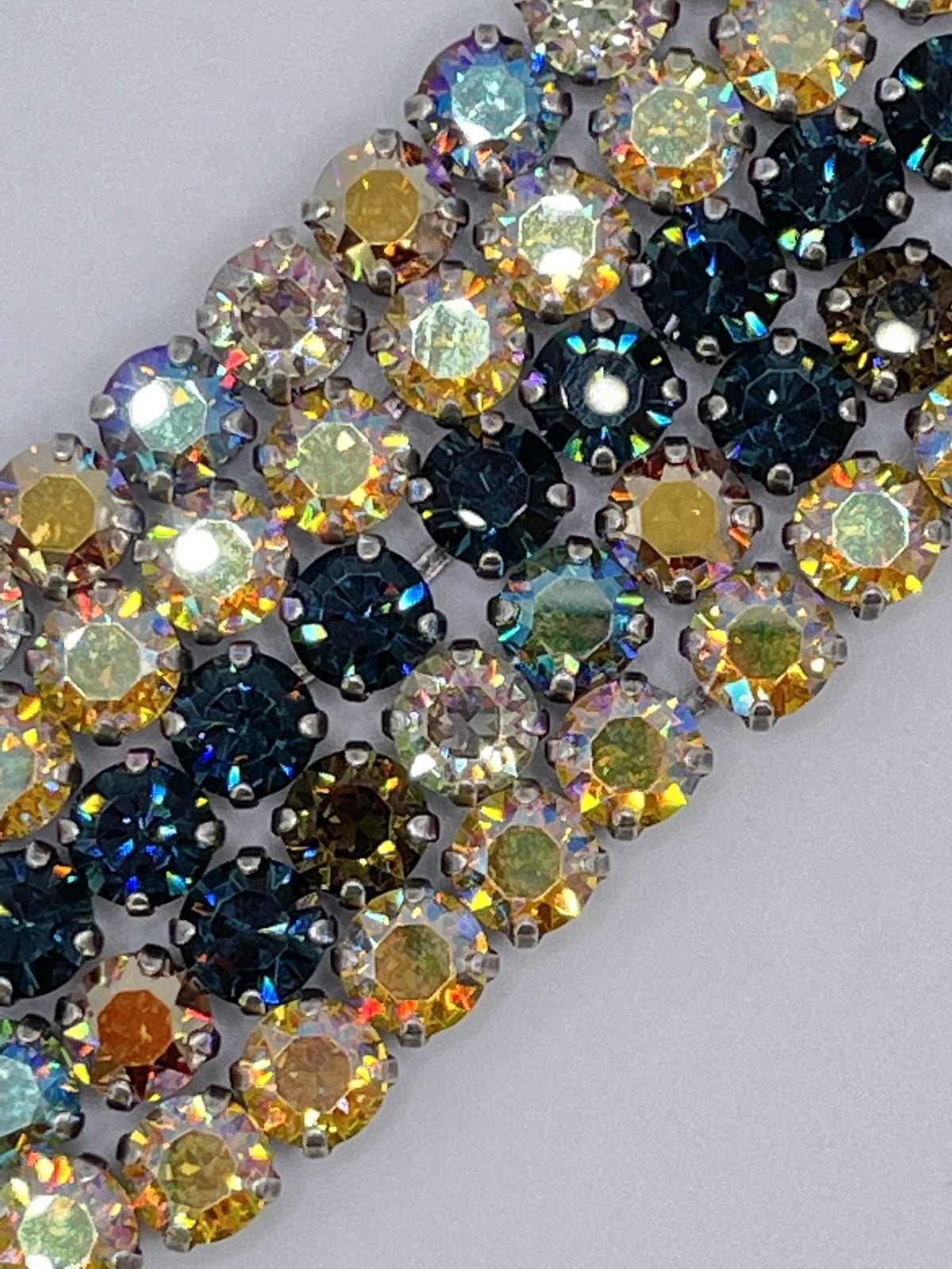 Classic Bracelet in Istanbul featuring dark blue, brown, and gold tones with a mixed material design.