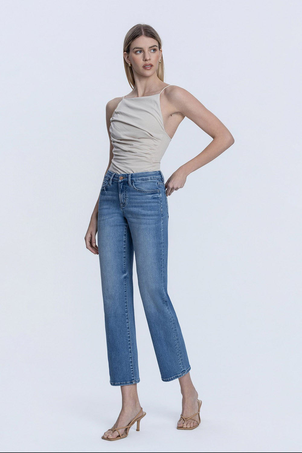 Delilah medium dark wash straight ankle jeans with mid-rise waist and five pockets