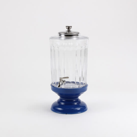 Fluted glass drink dispenser with a tall cylindrical shape.