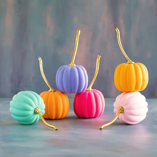 Medium rainbow pumpkin with gold leaf accents on a white background
