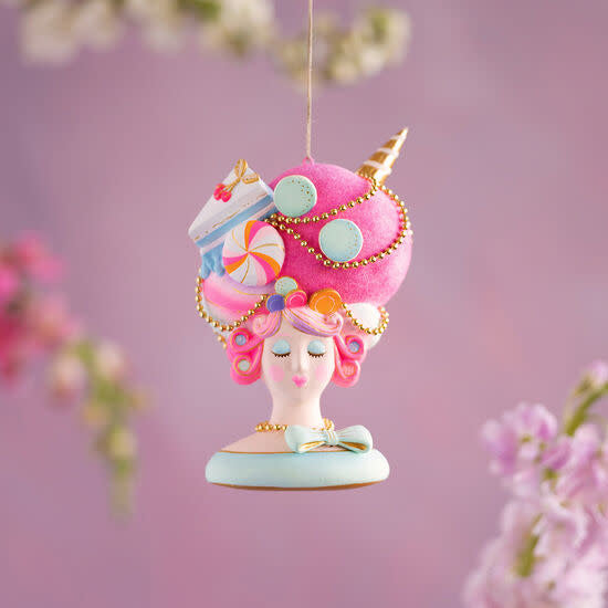 6-inch Marie Sweet ornament with hand-painted gold leaf trim on lightweight resin.