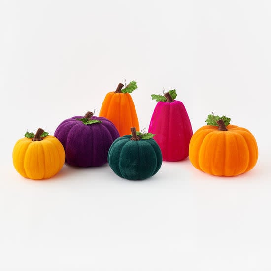 Large flocked pumpkin with a matte white textured finish.