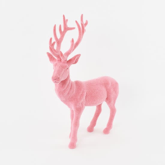 Large flocked pink deer statue with a solid color finish standing on four legs.