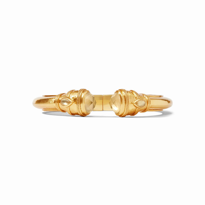 Cannes Demi Cuff in gold with shell pearl endcaps featuring pear-shaped gemstones and mother-of-pearl accents.