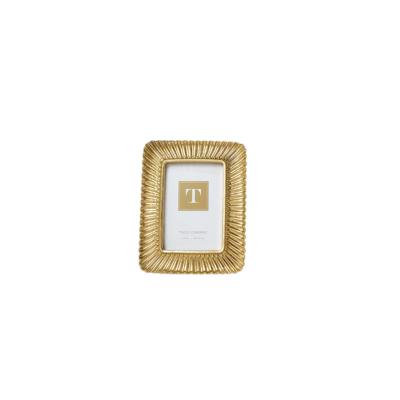 Sculpted gold photo frame with a decorative scalloped plume design and a white insert.