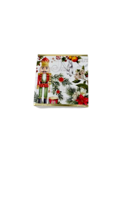 Small soap bar in holiday packaging featuring a nutcracker, pine branches, and winter berries.