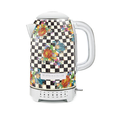 Electric kettle with stainless steel body featuring a Courtly Flower Market transfer pattern in blue and white floral design.