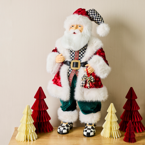 Animated Courtly Fabric Santa in a red velvet coat and checkered vest with paper Christmas trees.