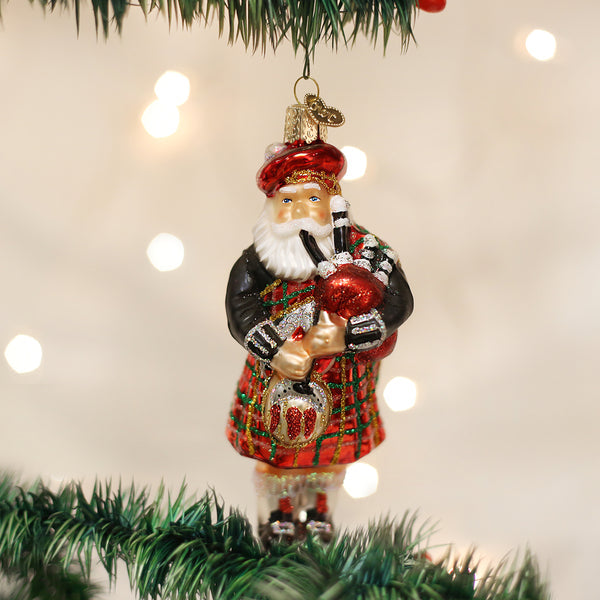 Highland Santa ornament featuring a red figure with white beard in traditional holiday silhouette.