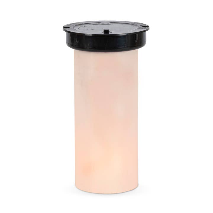 8-inch tall plastic solar candle with a black top and a glowing peach-colored cylindrical body.
