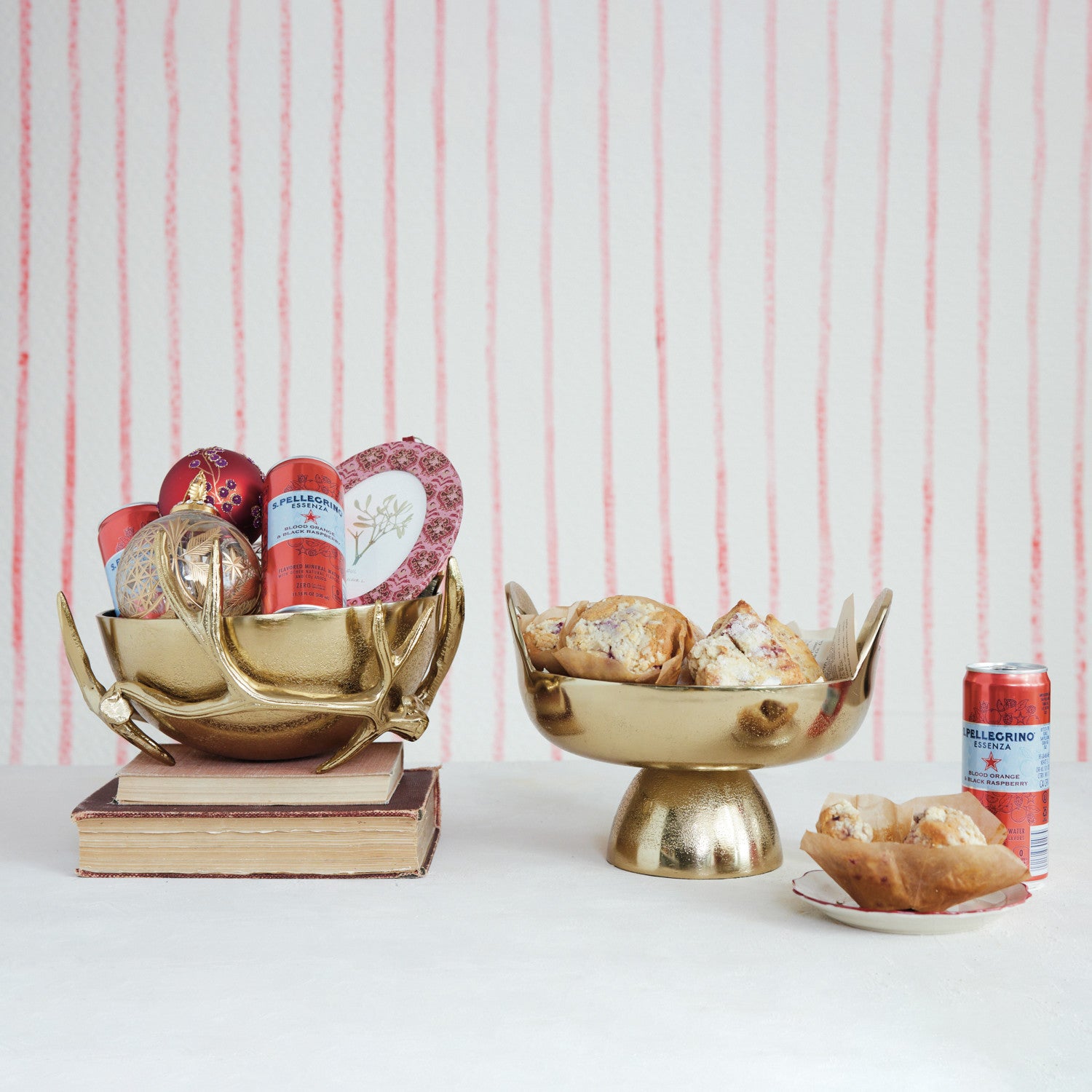 Gold cast aluminum antler shaped stand holding a round removable bowl filled with ornaments.