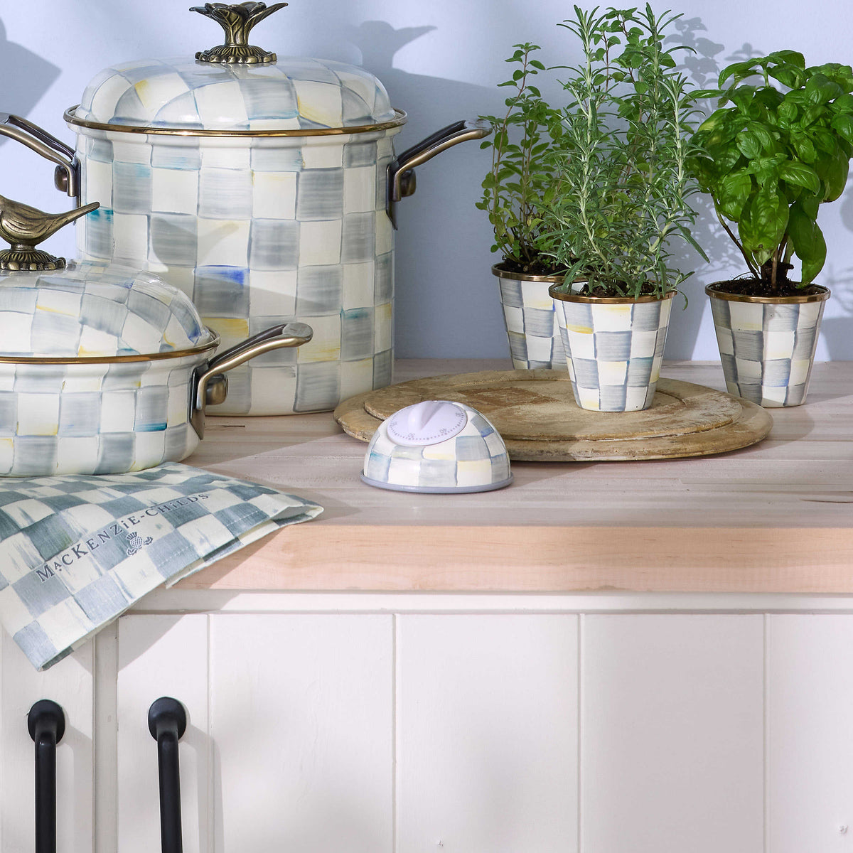 Hand-painted heavy-gauge steel kitchen timer with Sterling Check pattern and nylon dial.