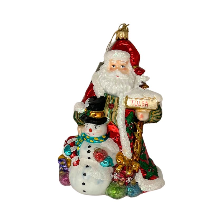 Hand-painted glass ornament featuring Santa Claus and a snowman holding a sign that says Tulsa.
