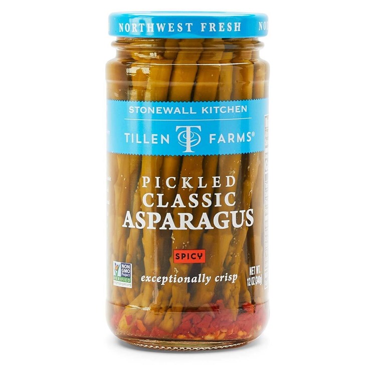 A 12 oz jar of Tillen Farms Pickled Classic Asparagus - Spicy with red pepper flakes at the bottom.