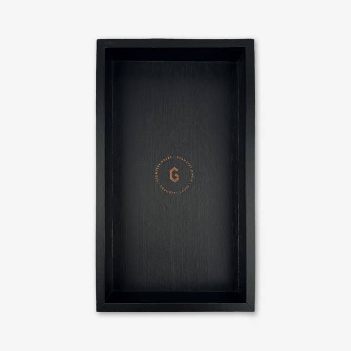 Black bamboo Not Paper Towel Tray with a gold logo in the center.