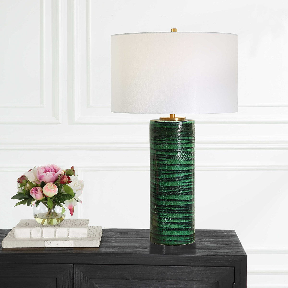 Galeno table lamp with a cylindrical shade in neutral tones.