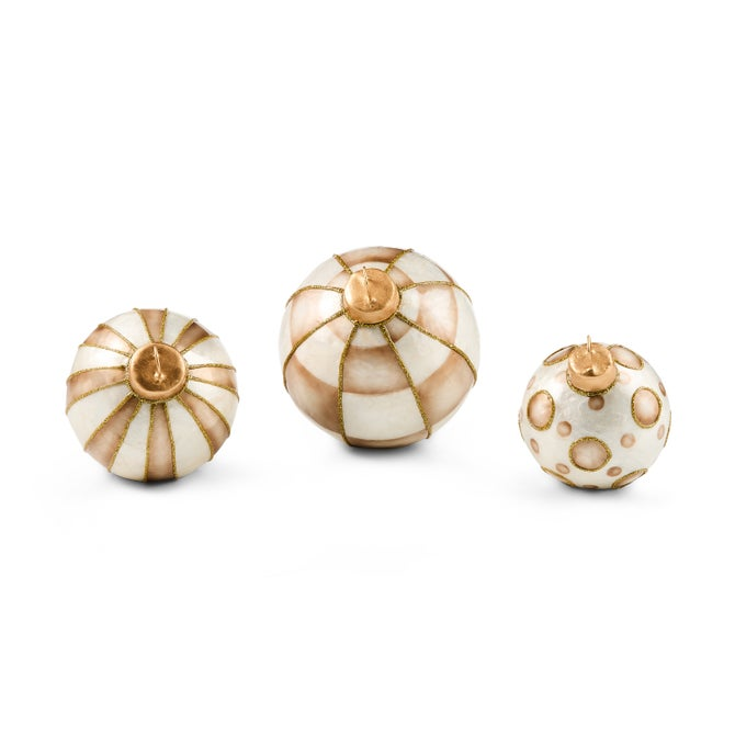 Three mocha capiz tabletop ornament balls with gold accents in striped and polka dot patterns.