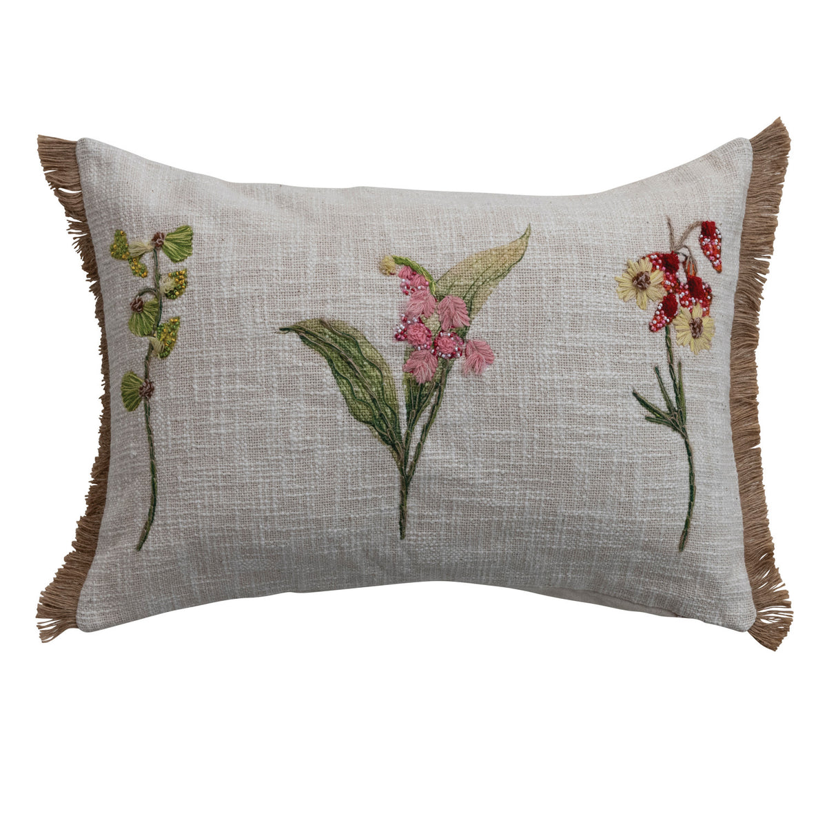Cotton slub lumbar pillow with three embroidered botanical floral designs and fringed edges.