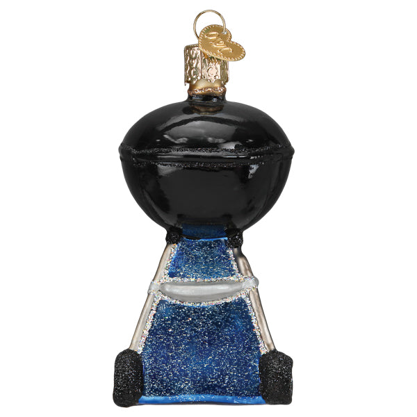 Black classic kettle-style barbecue grill glass Christmas ornament with blue glitter base.