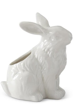 White porcelain rabbit-shaped container with smooth rounded ears.