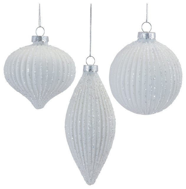 Set of three white glitter ribbed glass ornaments in onion, teardrop, and ball shapes.