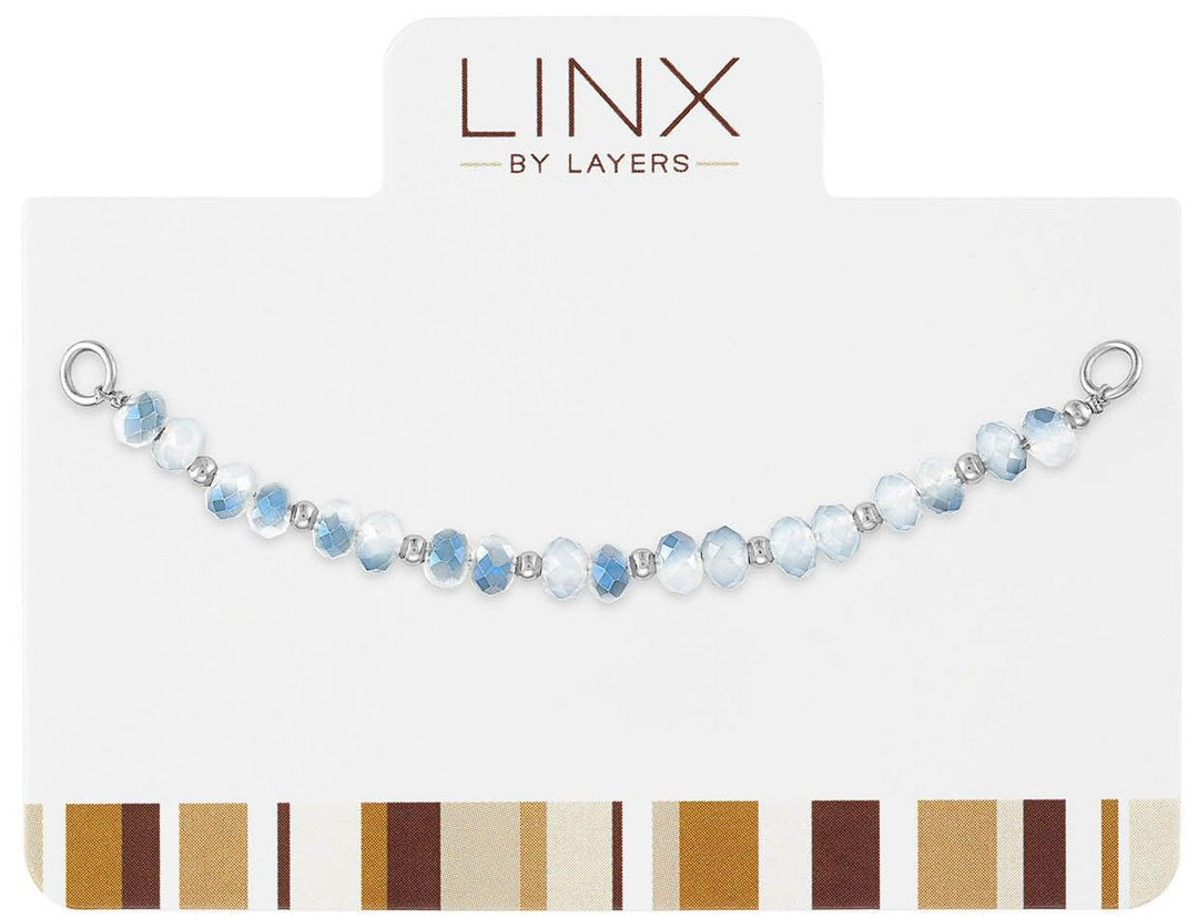 Silver LINX add-on featuring faceted beads transitioning from white to blue on a display card.