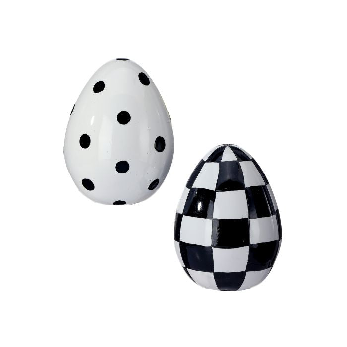 Hand-painted resin Easter egg with festive decorative details on a neutral background.