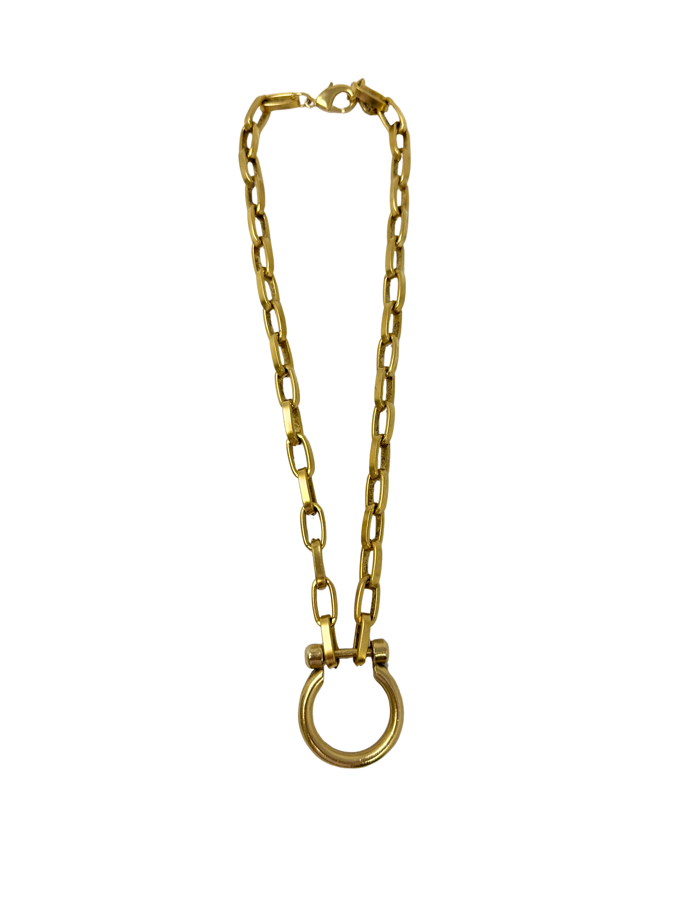 Lyla 17 inch gold chain necklace featuring a large circular toggle pendant and lobster clasp.