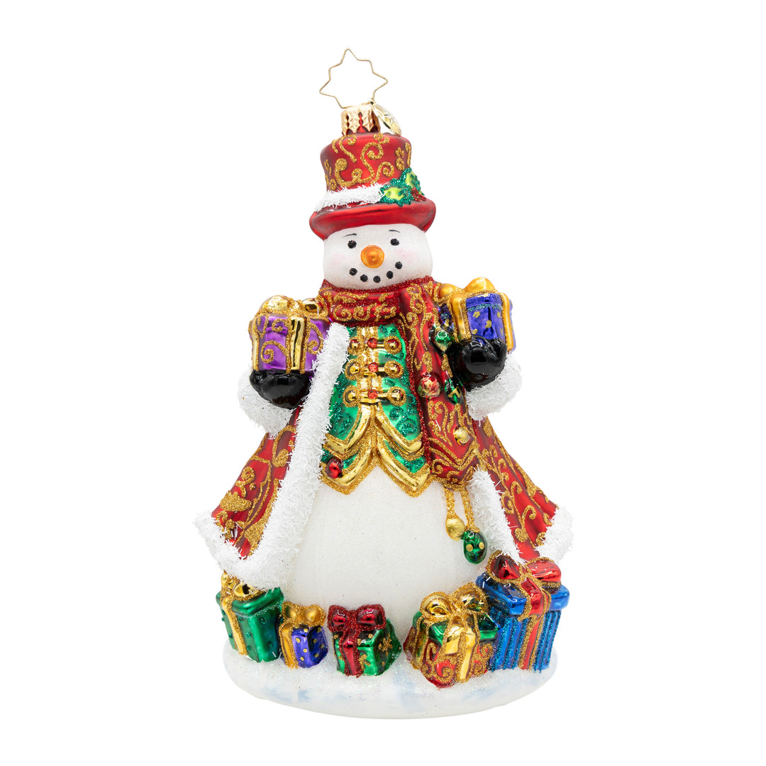 A Snowman For All Seasons glass ornament wearing a red hat and coat, holding and surrounded by gifts