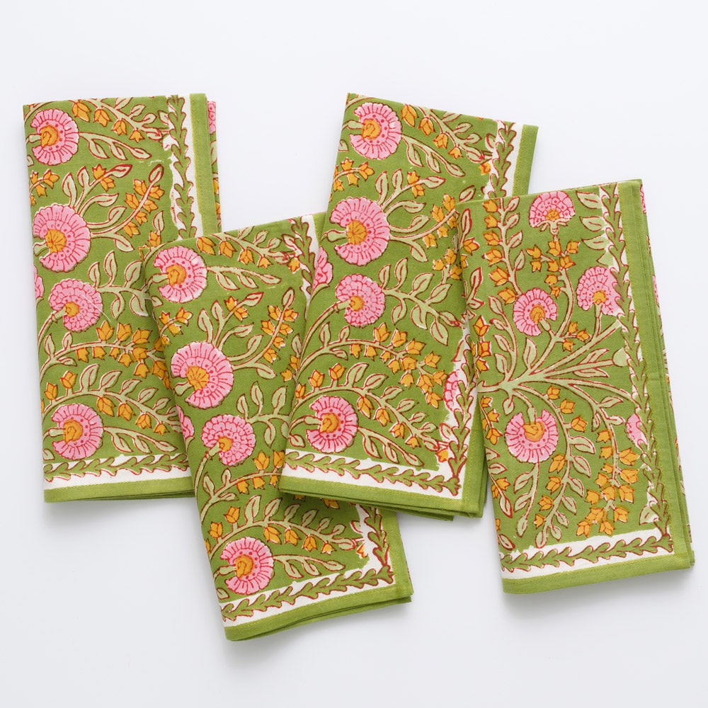 Set of four green cotton napkins with pink cactus flower and flamingo floral block print.