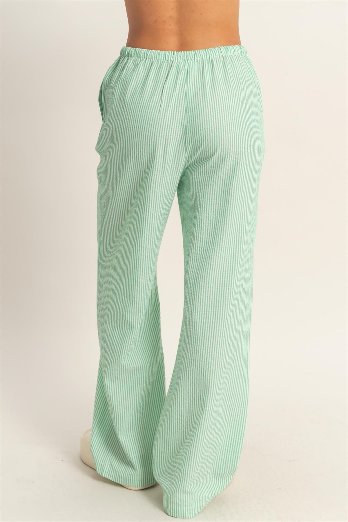 Arianne striped wide leg pants in polyester rayon blend with a relaxed silhouette.