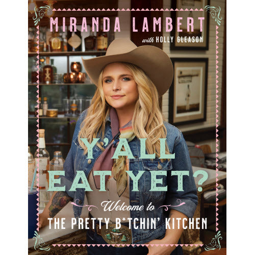 Y'all Eat Yet? cookbook with a colorful cover featuring food illustrations.