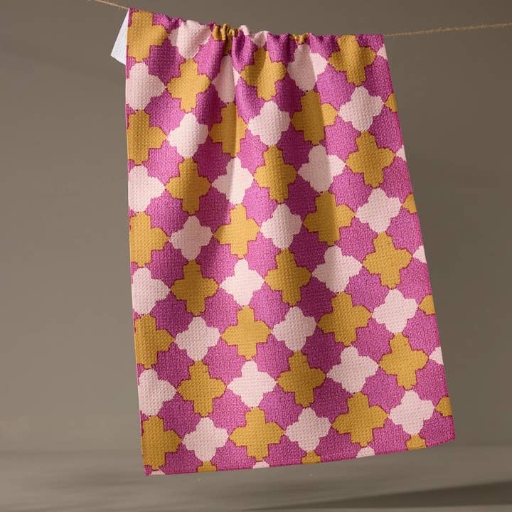 Spring-themed tea towel with floral print in waffle weave construction