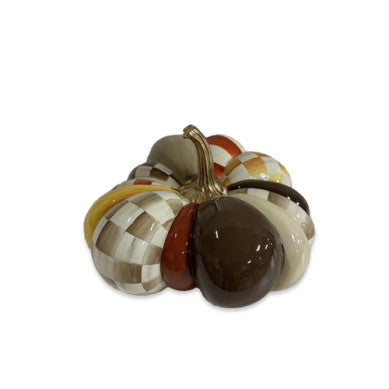 Medium pumpkin patchwork decoration in harvest glow orange with geometric patterns.