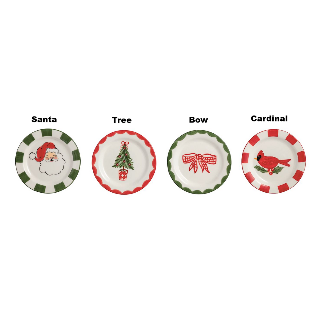 Four hand-painted ceramic Christmas tidbit plates: Santa, Tree, Bow, and Cardinal designs.