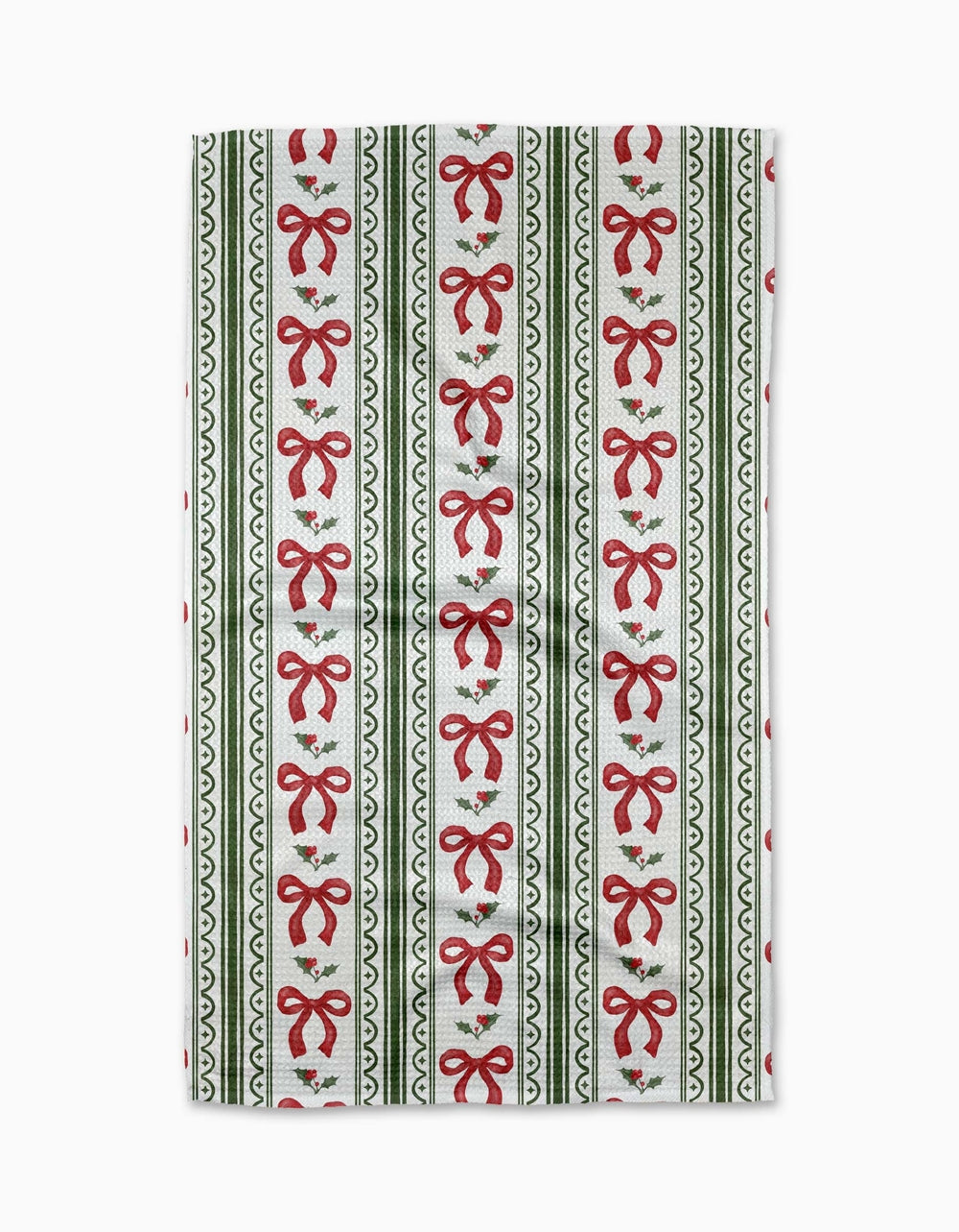 Holiday-themed waffle weave kitchen tea towel in red with green holly pattern