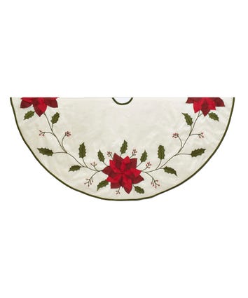 Ivory polyester tree skirt with round silhouette featuring red poinsettia applique pattern.