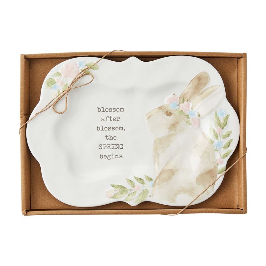Spring Bunny platter featuring a white ceramic surface with colorful bunny illustrations in spring floral patterns.