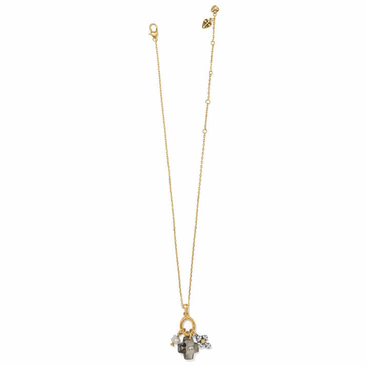 Two-tone crystal and potato pearl cross pendant on a silver lobster claw clasp with an adjustable chain.
